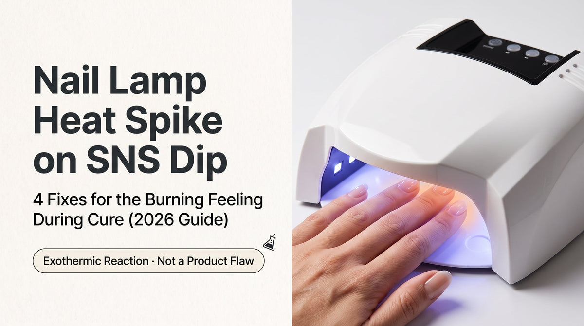 Hand curing SNS dip top coat under a cordless LED nail lamp with a warm glow highlighting the heat spike, illustrating the nail lamp heat spike guide for SNS dip users